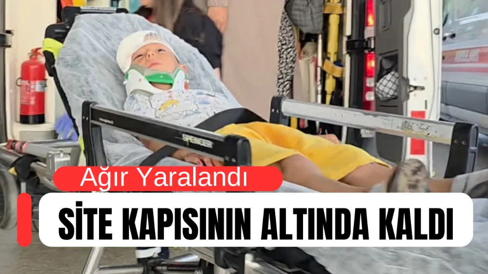 Devrilen site kapısının altında kalan çocuk ağır yaralandı !