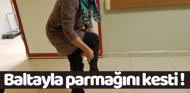 Baltayla parmağını kesti !
